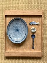 Blue ceramic spoon