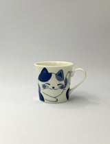 Coffee cup with cat motif