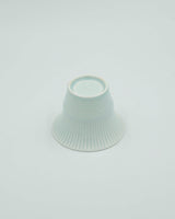 Pastelblå kop med riller