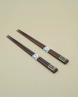 Chopsticks in brown wood
