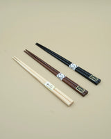 Chopsticks in brown wood