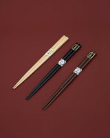 Chopsticks in brown wood