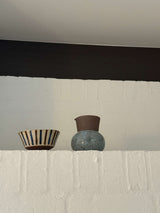 Gray jug with rustic glaze