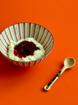 Beige ceramic spoon
