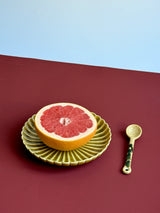 Beige ceramic spoon