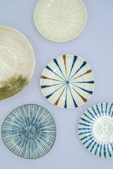 Small beige plate with stripes