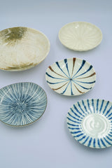 Small beige plate with stripes