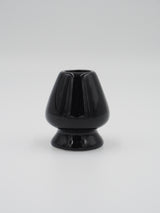Sort holder til matcha piskeris