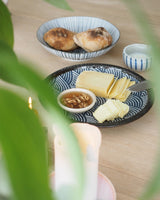 Plate / small dish with wave motif