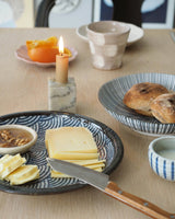 Plate / small dish with wave motif