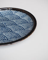 Plate / small dish with wave motif