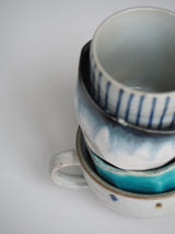 Blue striped mug without handle