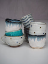 Blue striped mug without handle