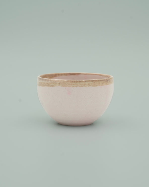 Pink cup with brown rim