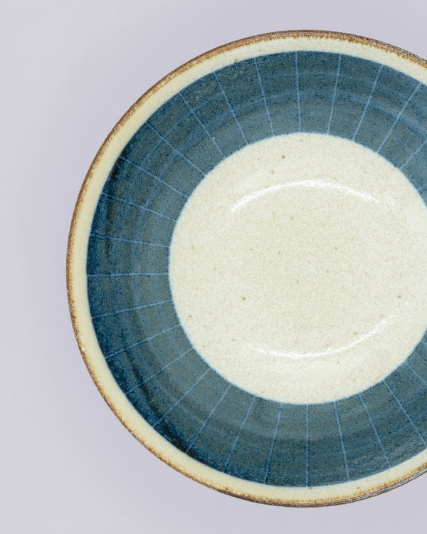 Small, deep plate with blue pattern