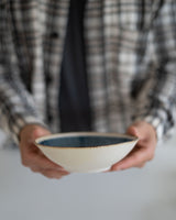 Small, deep plate with blue pattern
