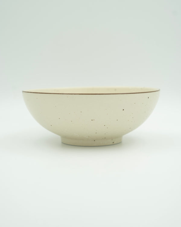 Sand colored serving bowl