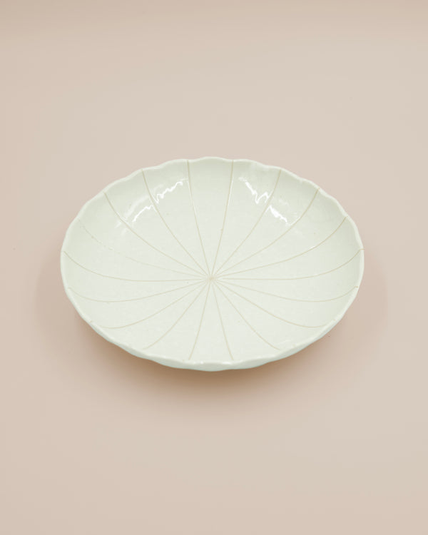 Large beige plate with stripes