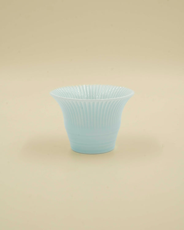 Pastel blue cup with grooves