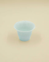 Pastel blue cup with grooves