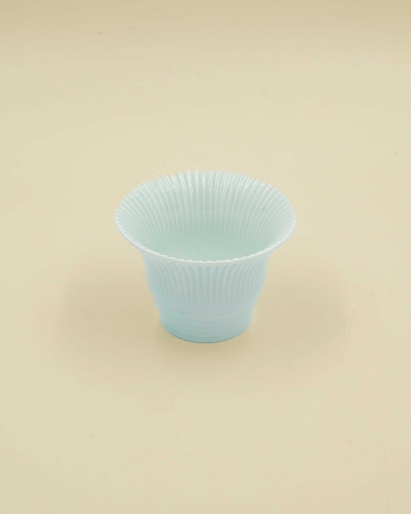 Pastel blue cup with grooves