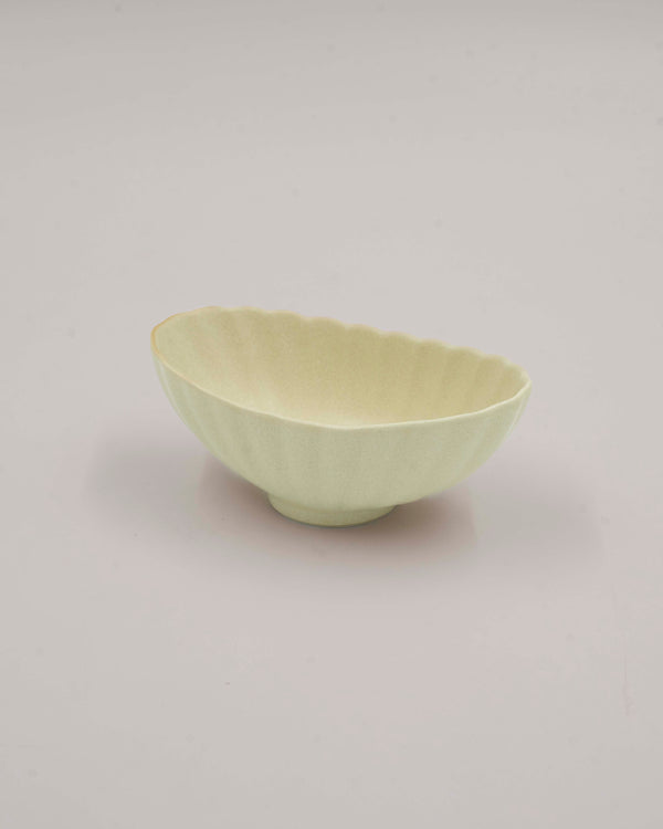 Small oblong beige bowl