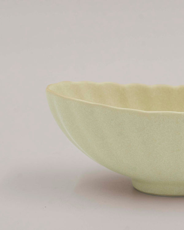 Small oblong beige bowl