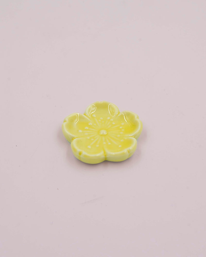 Yellow flower chopstick holder