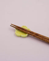 Yellow flower chopstick holder