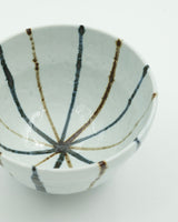 Light bowl with bluish stripes