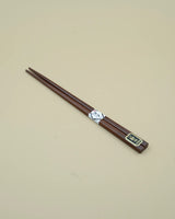 Spisepinde i brunt træ