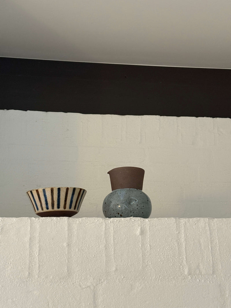 Gray jug with rustic glaze 