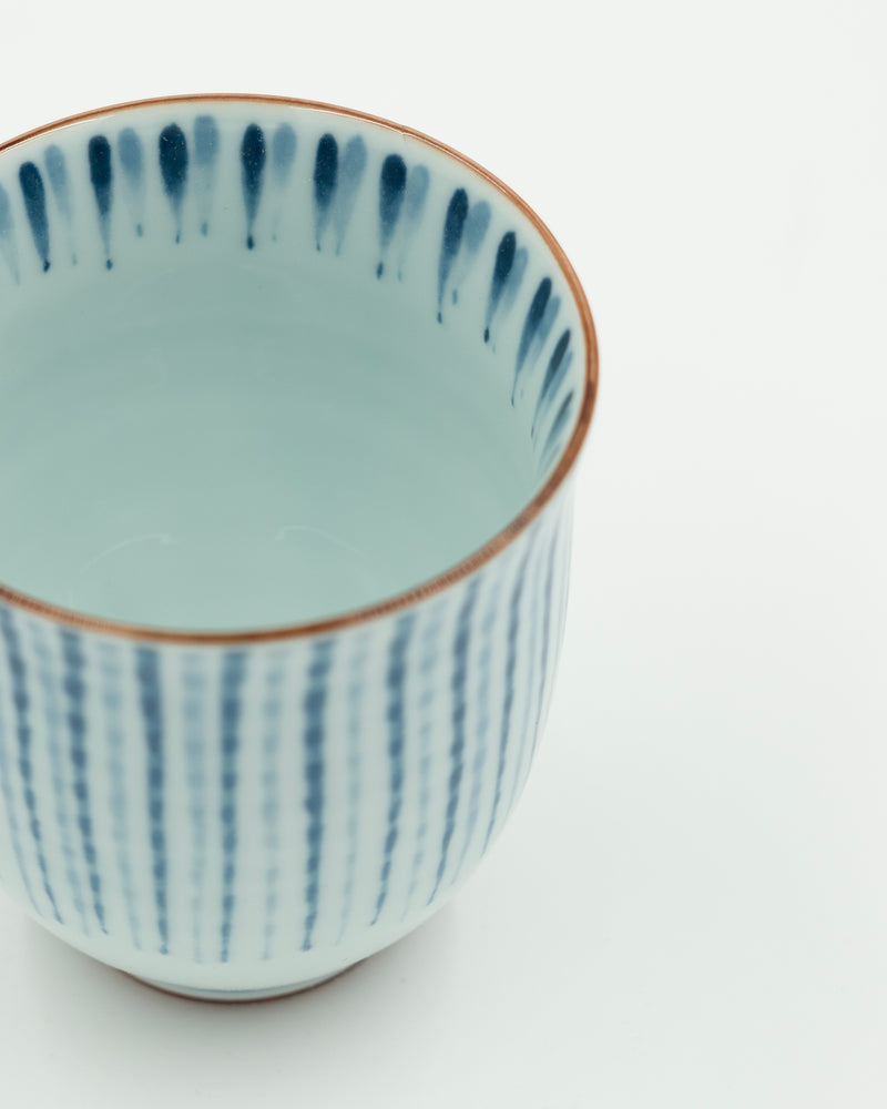 Tea cup with blue, elegant stripes
