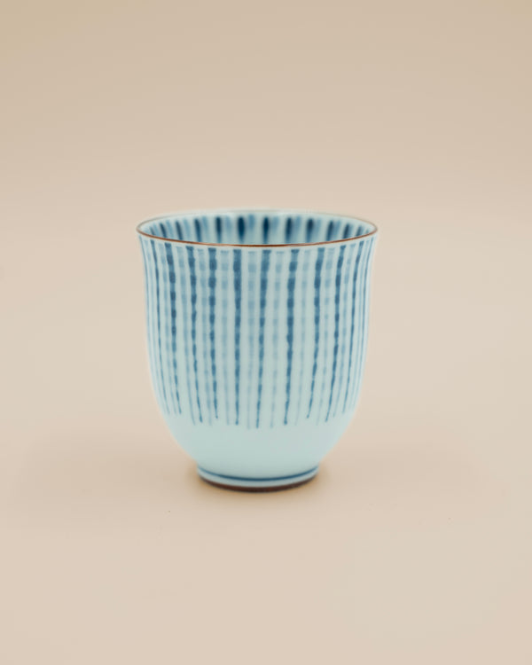Tea cup with blue, elegant stripes
