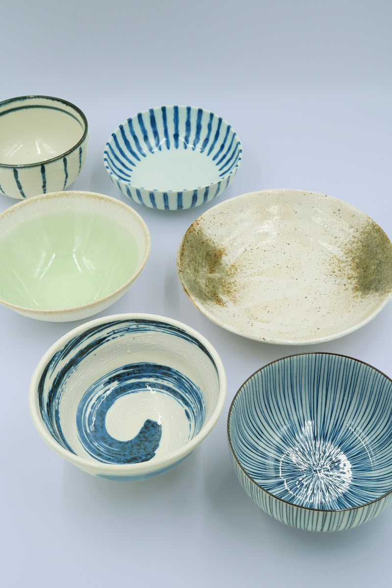 Ramen bowl with blue brush strokes