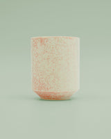 Pink mug with glaze splash