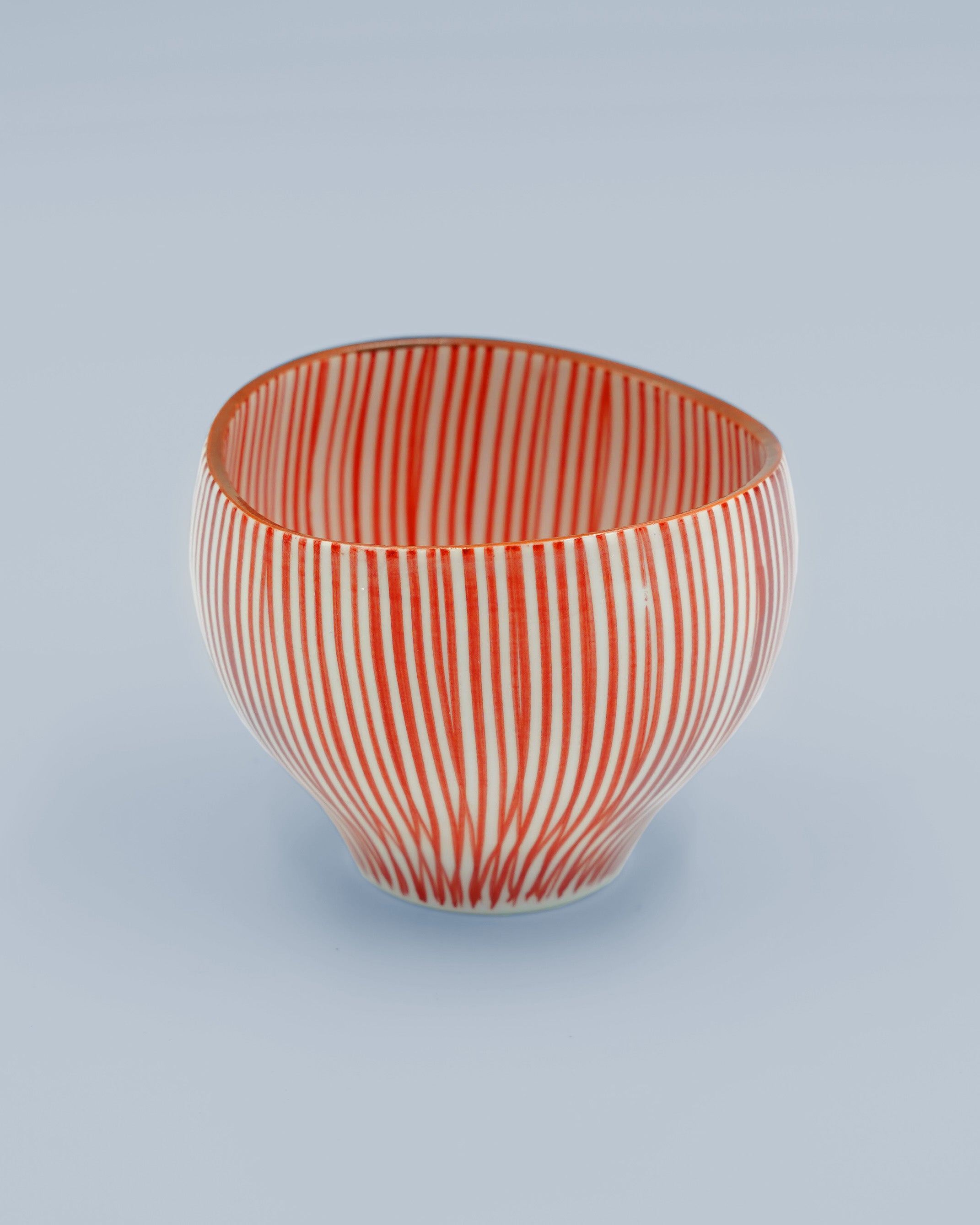 Large, red-striped mug in organic shapes