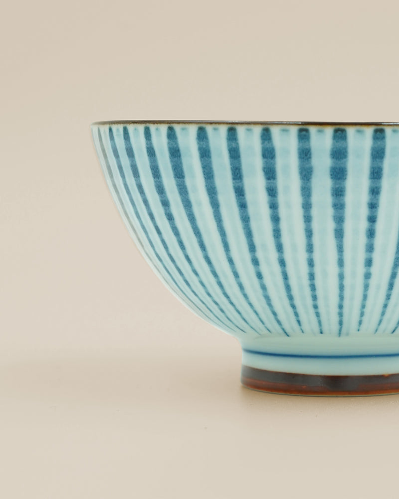 Bowl with light blue, elegant stripes