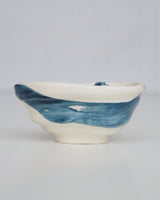 Asymmetric bowl with blue brush strokes