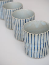 Blue striped mug without handle