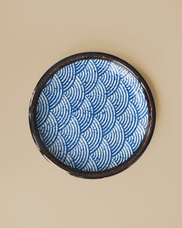 Plate / small dish with wave motif