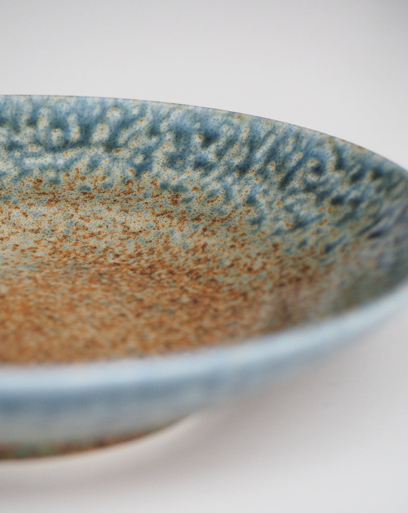 Brown deep plate with blue glaze